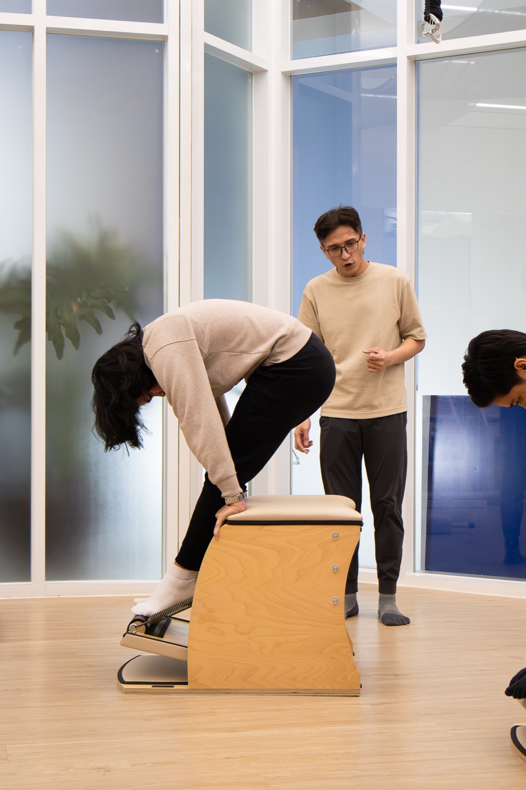 A teacher guiding a client